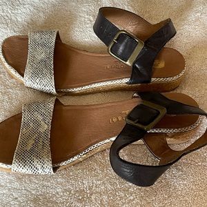 Eric Michael snake skin and black sandals with a tiny wedge. Guc